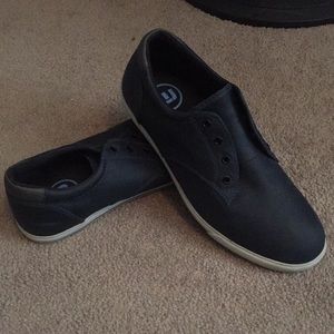 Travis Mathew tennis shoes.